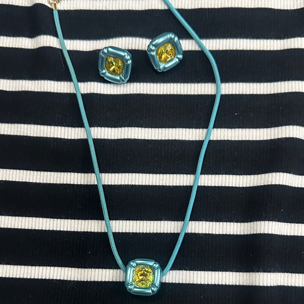 Swarovski Blue Necklace with Yellow Accents on Striped Dress